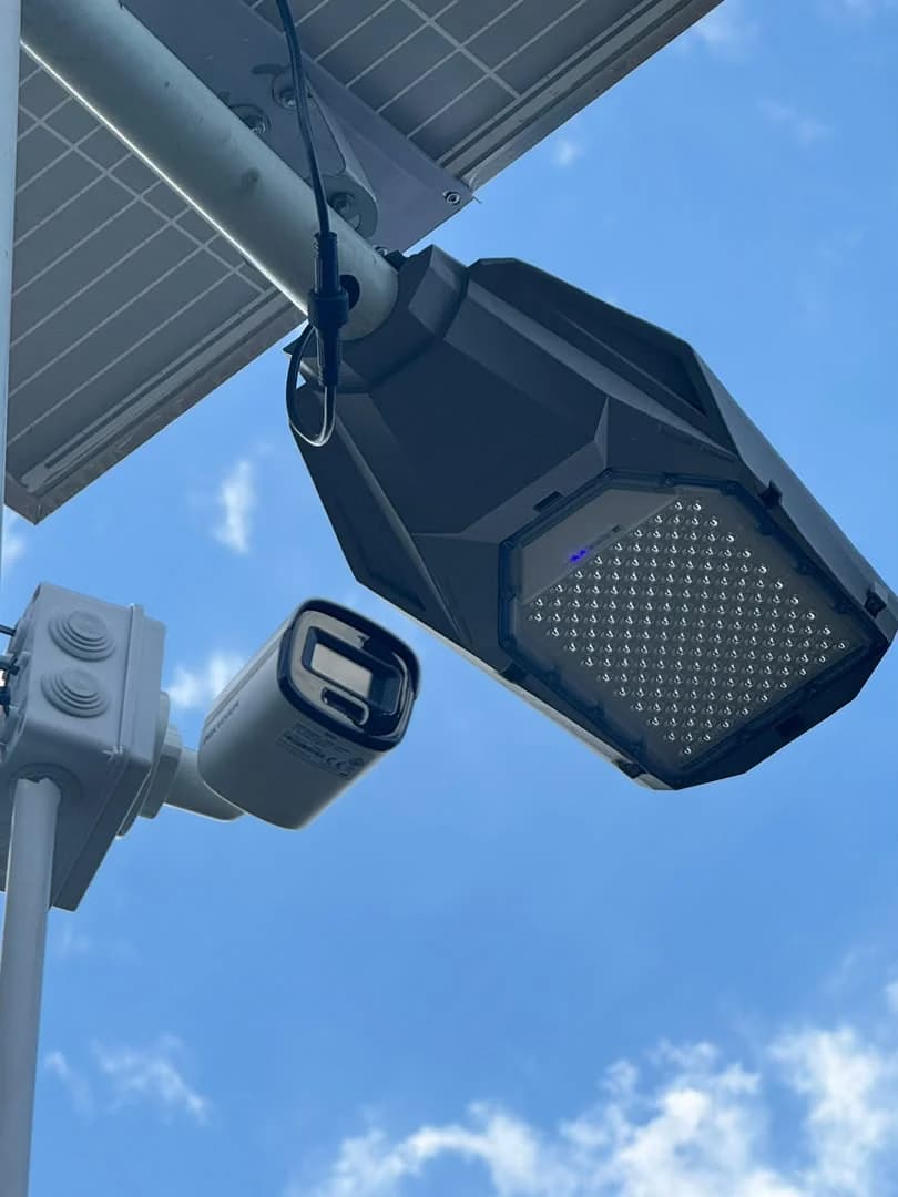 Outdoor CCTV camera mounted on a solar-light pole